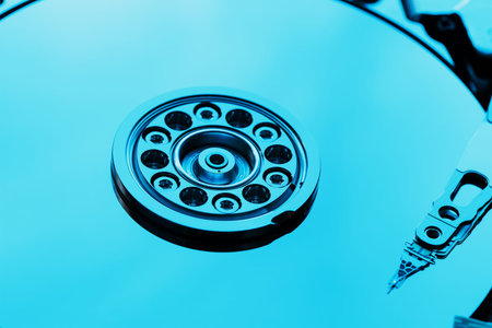 Disassembled hard drive from the computer, hdd with mirror effect. Opened hard drive from the...