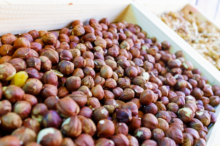 Hazelnut on the counter in the store. Raw nuts, vegetarian and diet food. With a soft focus.の写真素材