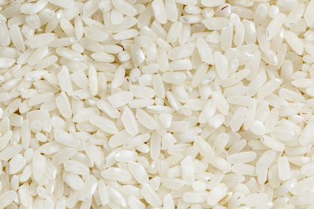 White rice background and texture. Rice grain. View from above. Close-up. macroの写真素材