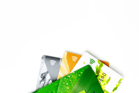 Credit cards with contactless payment. Pile of credit cards on white isolated background. Selective...