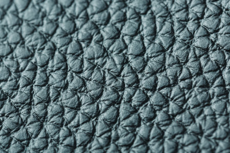 Green textured leather closeup. Full frame, close up. Macro