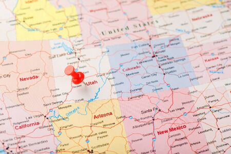 Red clerical needle on a map of USA, Utah and the capital Salt Lake City. Closeup Map Utah with Red Tack, US map pinの写真素材