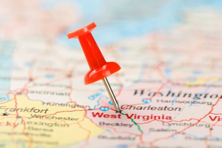 Red clerical needle on a map of USA, South West Virginia and the capital Charleston. Close up map of South West Virginia with red tack, United States map pin USAの写真素材