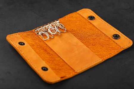 front view of brown leather wallet isolated on white backgroundの写真素材