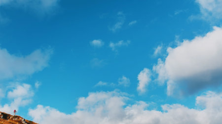 Landscapes with blue sky and clouds, Route through the mountain peaks and hills through the...