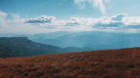 Route through mountain peaks and hills through majestic landscapes. Active tourists, hiking, Caucasus Mountains Oshten Fisht. Sport lifestyle conceptの写真素材