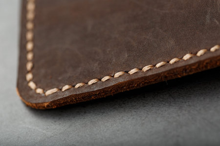 Dark Brown Leather Passport Cover. Genuine leather, handmade. Close up stitching
