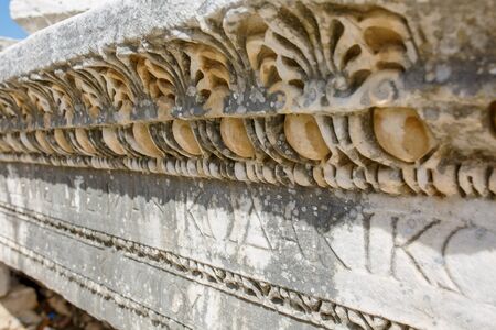 Beautiful and graceful ornament, an element of buildings. Parts of the ruins and ruins of ancient antiquity. The art of ancient Greece. City of Ephesusの写真素材