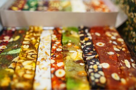 Eastern sweets, confectionery on the counter, Sherbet, Dzhezerye, halva, Turkish delight baklava. Istanbul the capital of Turkeyの写真素材