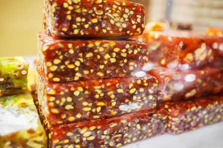 Eastern sweets, confectionery on the counter, Sherbet, Dzhezerye, halva, Turkish delight baklava. Istanbul the capital of Turkeyの写真素材