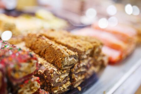 Eastern sweets, confectionery on the counter, Sherbet, Dzhezerye, halva, Turkish delight baklava. Istanbul the capital of Turkeyの写真素材