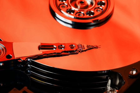 The hard disk from the computer HDD is red, with a mirror effect. The hard drive from the computer...