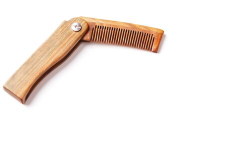 Sandalwood comb on a white background. Hair care. Isolate.の写真素材