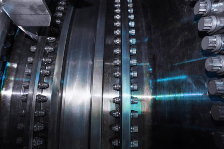 A detailed view of the gas turbine engine for generating electricity, shows the bolt connection...
