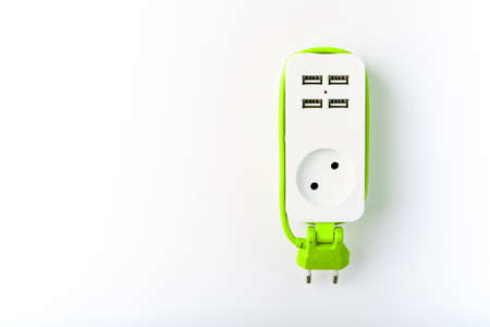 USB Power Strip Green power cord for charging gadgets and electronic devices. On a white background, isolate. Free spaceの写真素材