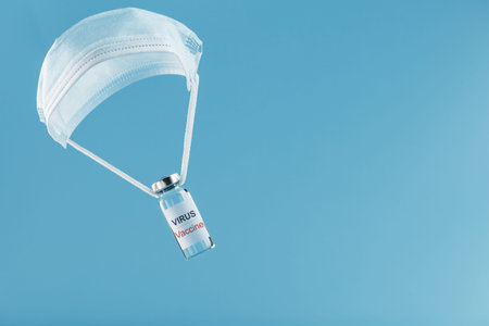 Cure for the virus and disease on a medical oil paroshut on a blue background. COVID-19 anti-virus...