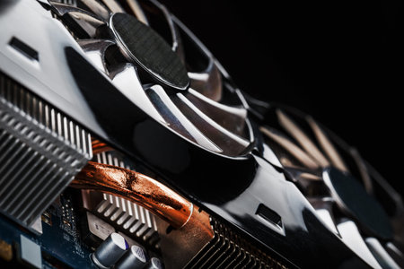 Video card with a cooling system with copper pipes, aluminum radiators and fans. Video chip for...