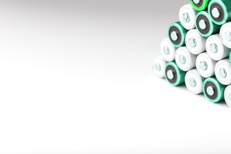 AA batteries in rows on a white background with free space. The concept of energy supply and...