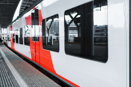 Wagons A modern high-speed train stands on a platform.の写真素材