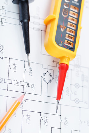 Yellow voltage indicator in close-up on the electrical diagram