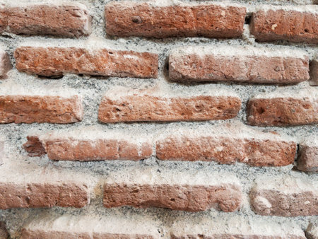 The background of the wall of the old red kerpick masonryの写真素材
