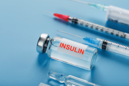 Medicine in ampoules with insulin, needles and syringes for medical subcutaneous injectionの写真素材
