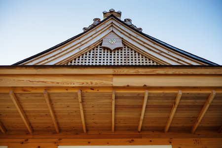 The roof of a building in a Japanese garden againstの写真素材