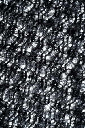 Texture of black fleece, shaggy high-tech synthetic knitの写真素材