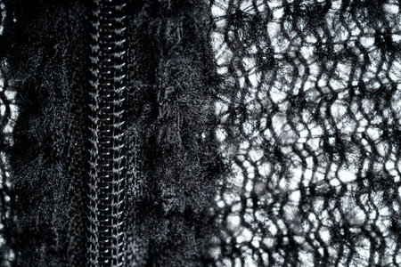 Zipper on black fleece background close-upの写真素材
