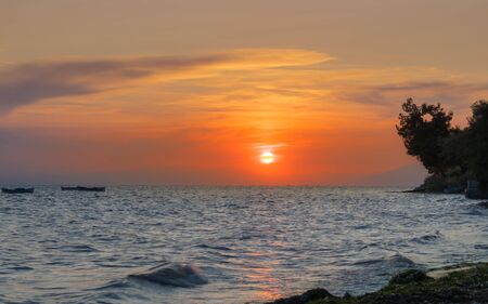Beautiful sea sunset golden hour during summerの写真素材
