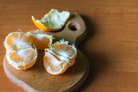 slices of orange on wooden tableの写真素材