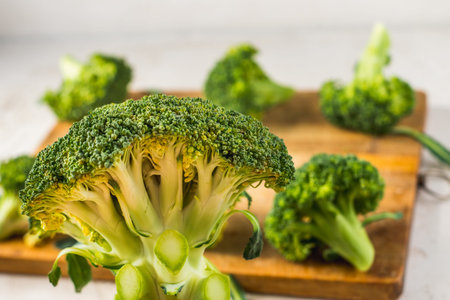 fresh broccoli on a wooden board