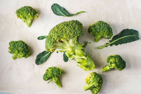 fresh healthy broccoli on a light backgroundの写真素材