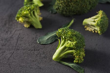 fresh healthy broccoli on a dark backgroundの写真素材