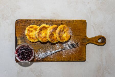 healthy curd pancakes with fresh berry sauceの写真素材