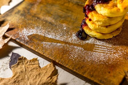 healthy curd pancakes with fresh berry sauceの写真素材