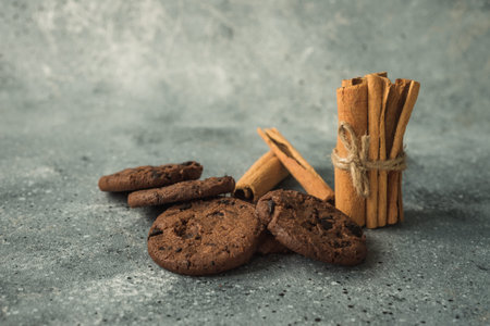 tasty healthy cookies and cinnamon and anise on the table