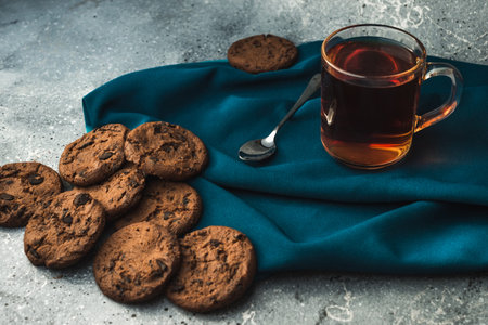 cup of black tea with cinnamon and star anise