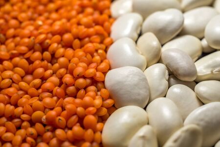 healthy eating vegetarian beans lentils and peas on a dark backgroundの写真素材