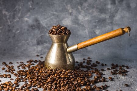 coffee beans on burlap background with copy space for textの写真素材