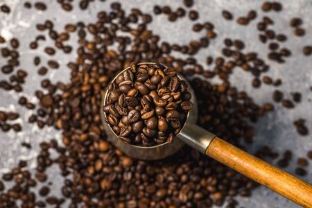 coffee beans on burlap background with copy space for textの写真素材