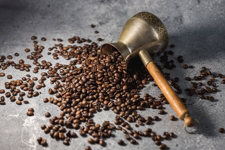 coffee beans on burlap background with copy space for textの写真素材