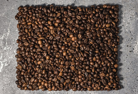 aroma coffee beans on burlap background for your textの写真素材