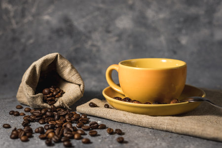 aroma coffee beans on burlap background for your text