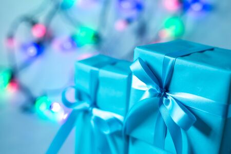 color christmas balls and gift box on gray backgroundの写真素材