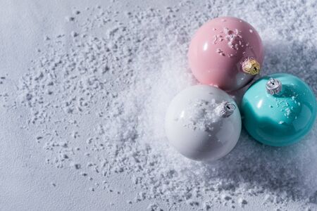 color christmas background with balls and snowflakesの写真素材