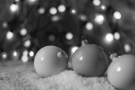 christmas ball on a color lights backgroundの写真素材