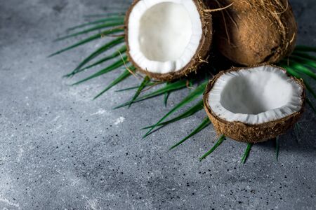 ripe chopped coconut on a gray stone backgroundの写真素材