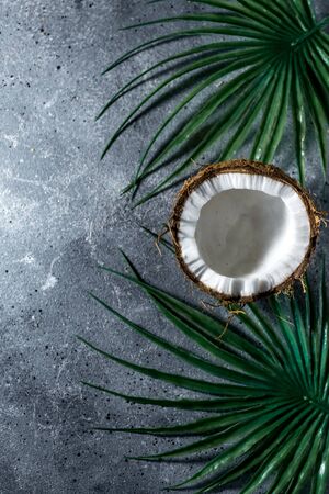 ripe chopped coconut on a gray stone backgroundの写真素材