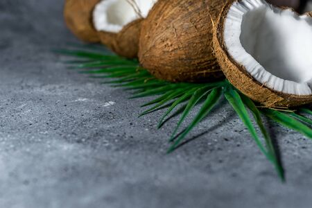 ripe chopped coconut on a gray stone background.の写真素材